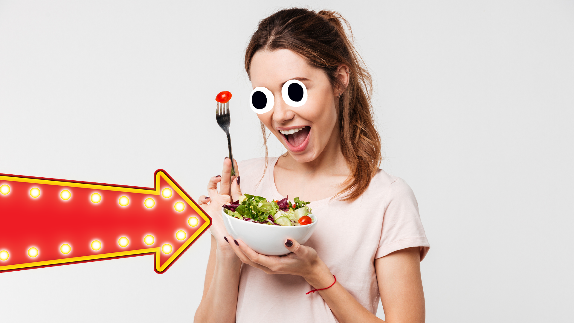 Smiling woman with salad and arrow