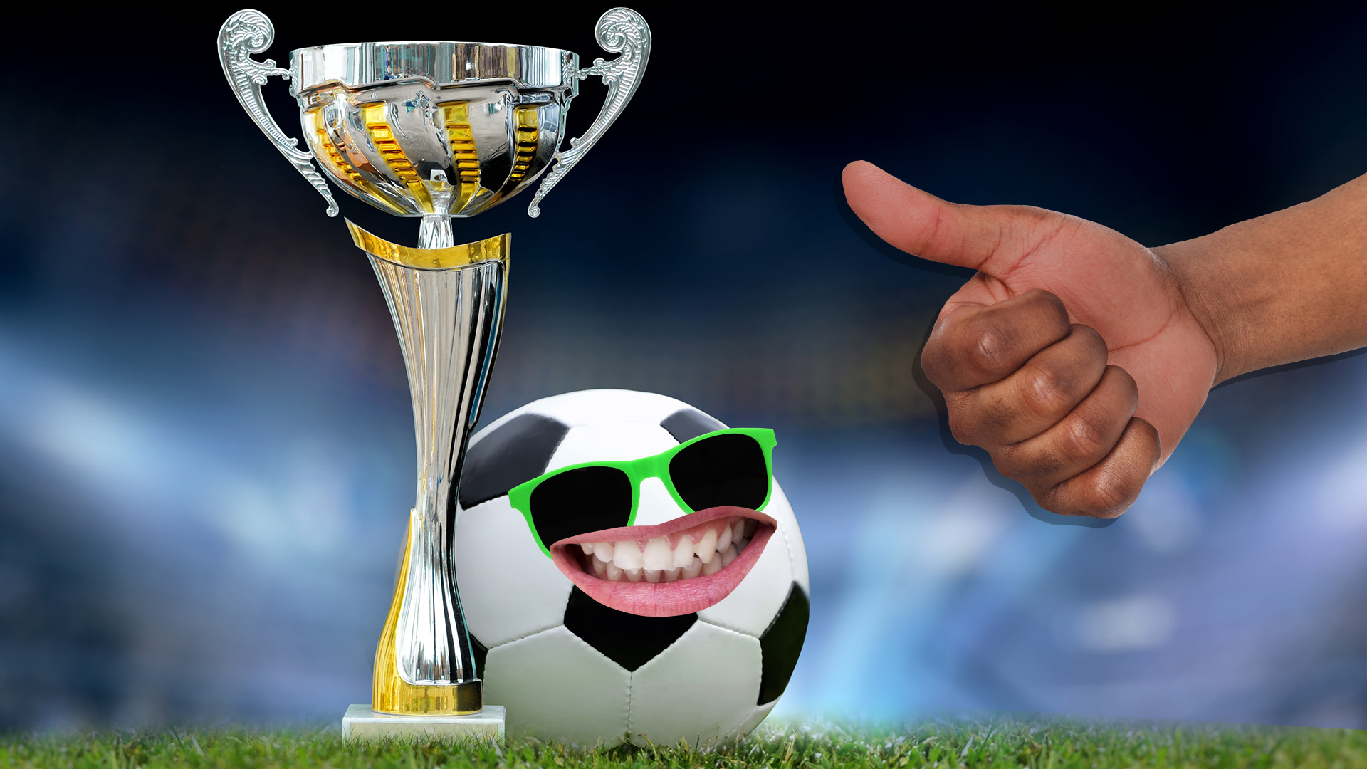 A person giving the thumbs up to a football and trophy