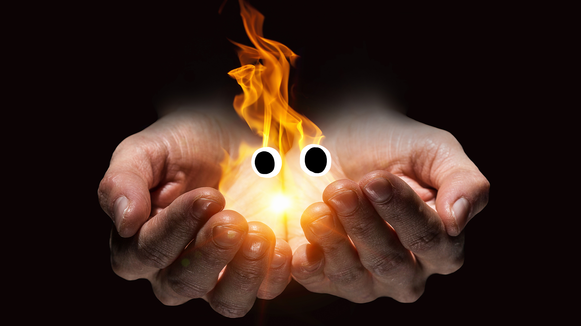 Hand full of fire magic with eyes