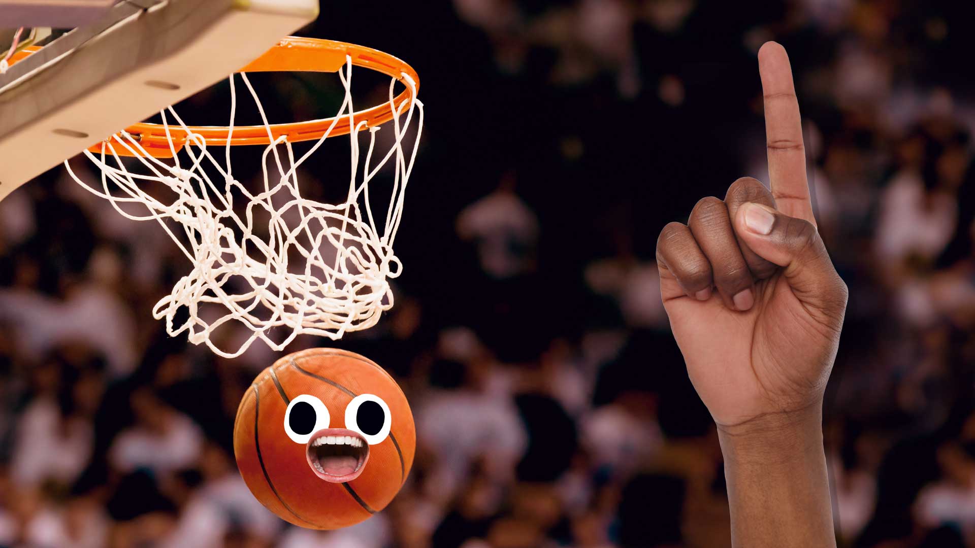 A basketball going through the hoop