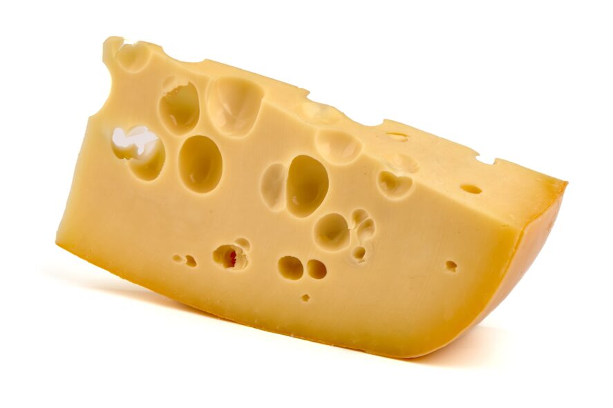A wedge of cheese with holes