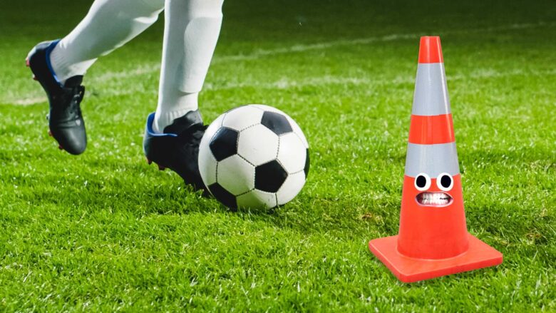 Football training and a plastic traffic cone