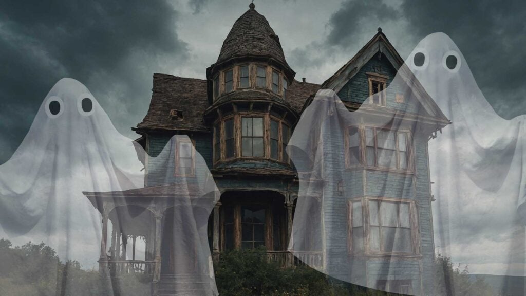 Two ghosts outside of a haunted house