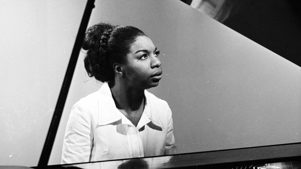 Nina Simone playing the piano