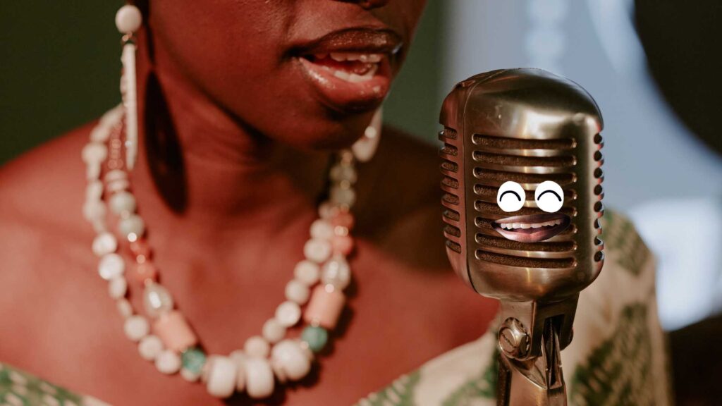 Africa-American woman singing into an old-fashioned microphone