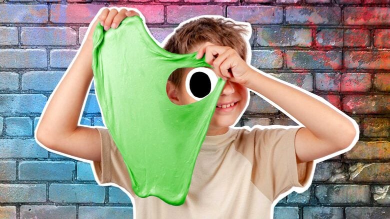 A boy stretching green slime