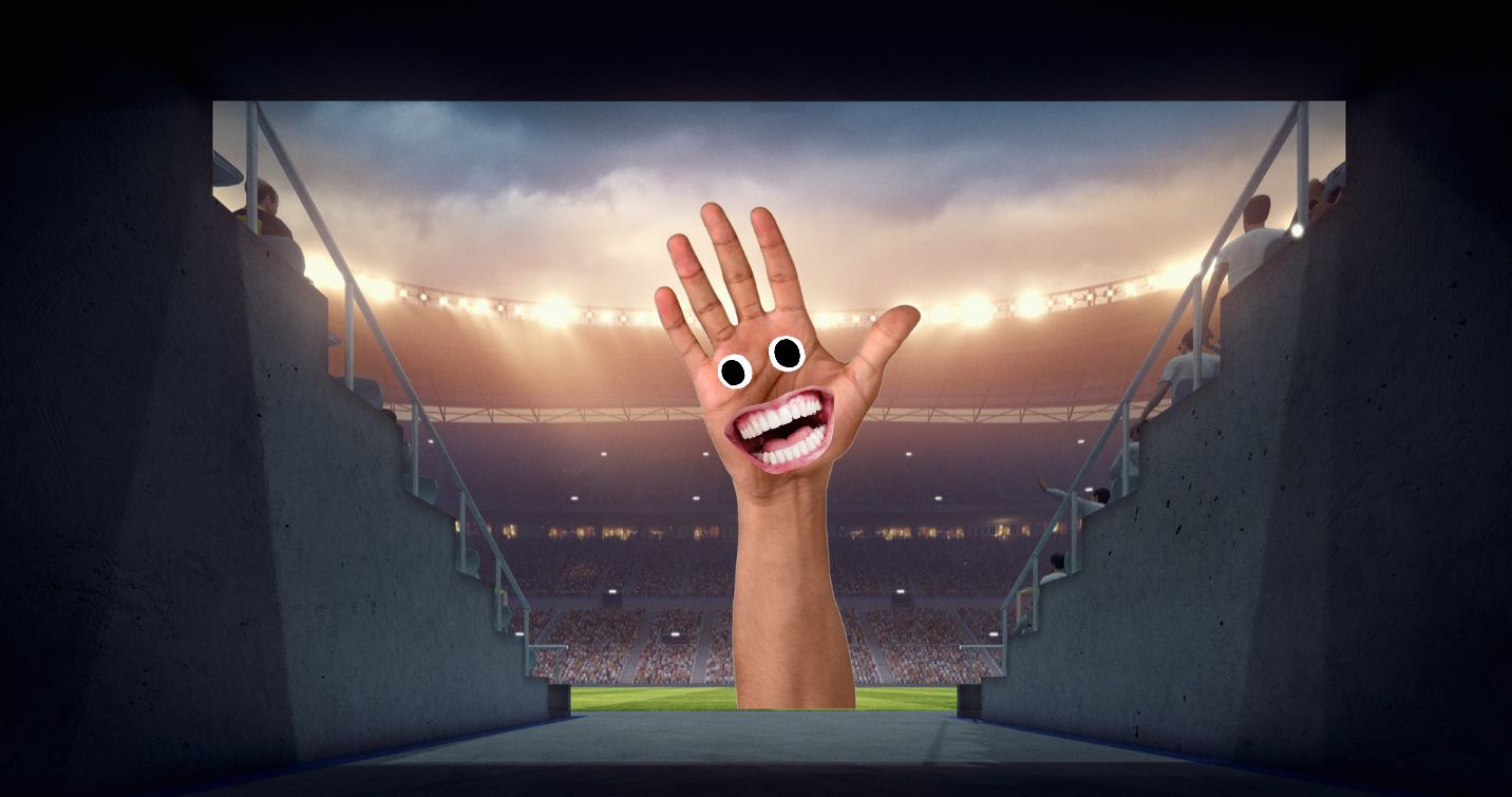 A big hand waving in a football stadium 