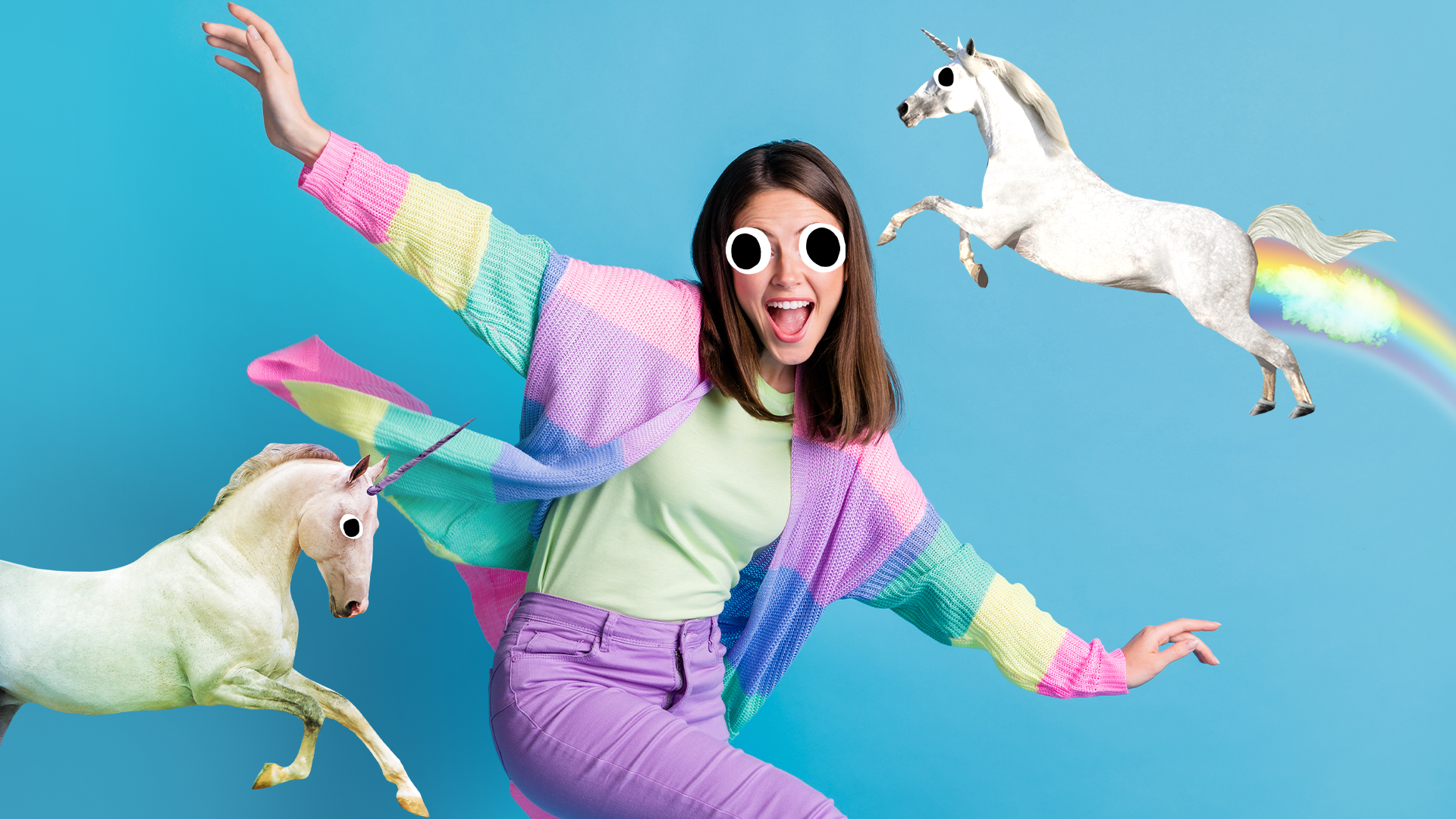 A brightly dressed woman hanging out with unicorns