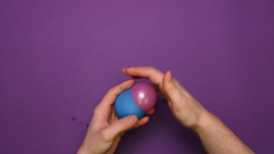 Cut the end off a new balloon, and squeeze the balloon in again